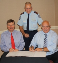 AFAC&#039;s Stuart Ellis and CAVFA Chair Brian McKinlay AFSM, with VFBV President Hans van Hamond AFSM. 